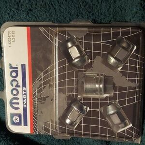 Dead stock vintage Daimler Chrysler bright chrome nuts